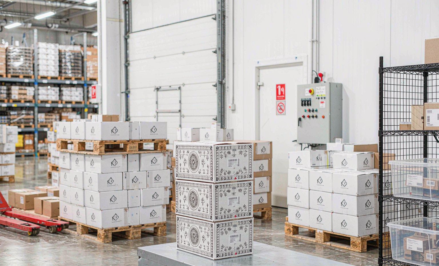 Finished YANE Beauty skincare cartons packed on pallets ready for export